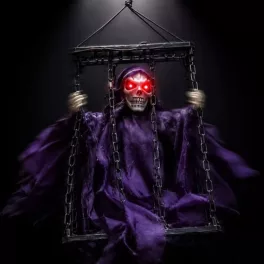  Lógó, láncos kalitkába zárt, LED-es hangot adó animált Halloween-dekoráció csontváz