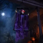 Lógó, láncos kalitkába zárt, LED-es hangot adó animált Halloween-dekoráció csontváz