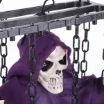 Lógó, láncos kalitkába zárt, LED-es hangot adó animált Halloween-dekoráció csontváz