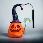 Halloween boszorkánykalapos világító és kacagó töklámpás tartónyéllel